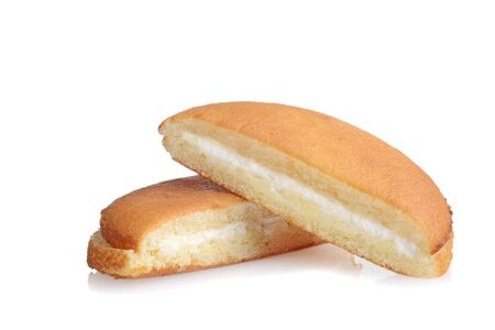 two slices of vanilla sponge cake with cream fillingの写真素材