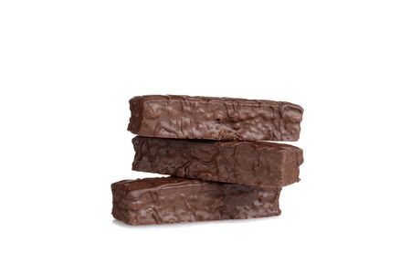 stack of chocolate bar cakes on whiteの写真素材