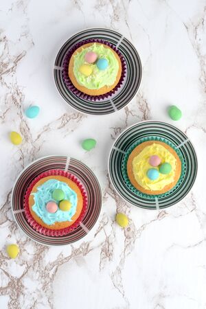 top view easter cupcakes with eggsの写真素材