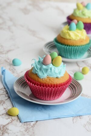 easter cupcakes with mini eggsの写真素材