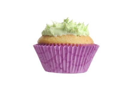isolated cupcake with green frosting on white backgroundの写真素材