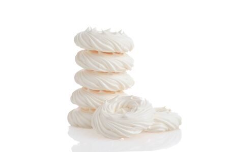 pile of meringue nests on whiteの写真素材