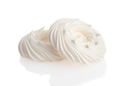 closeup empty meringue nests on whiteの写真素材