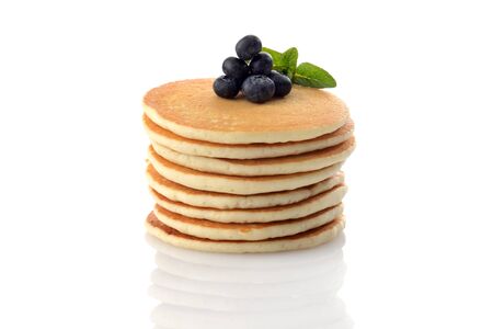 stack of pancakes with blueberries on whiteの写真素材