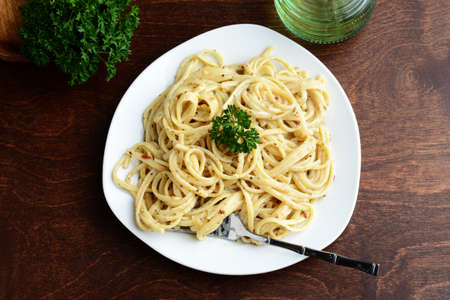 top view spaghetti with white cream sauceの写真素材