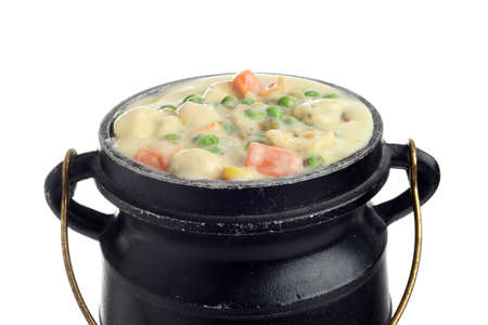 closeup isolated pot of chicken vegetable cream soupの写真素材