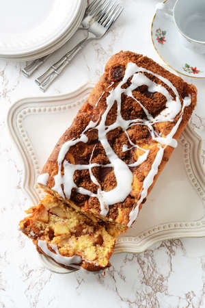 top view sliced country apple fritter loaf bread cakeの写真素材