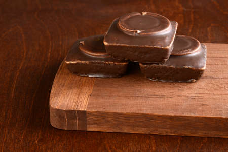 pile of chocolate covered cakesの写真素材