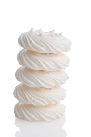 stack of meringue nests on whiteの写真素材
