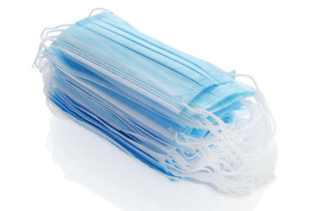 stack blue medical face masksの写真素材