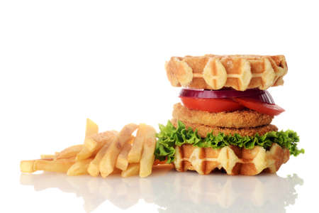 chicken burger waffle sandwich with french fries on whiteの写真素材