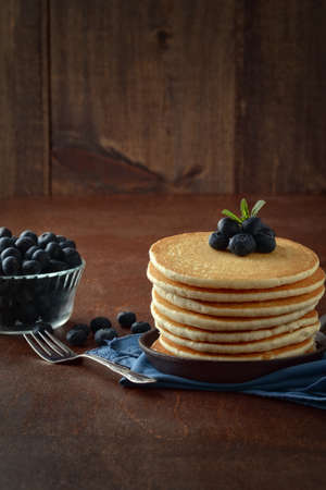 breakfast blueberry pancakes in a cast iron skilletの写真素材