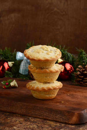 christmas mincemeat pies on woodの写真素材