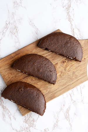 top view chocolate cream cake slicesの写真素材