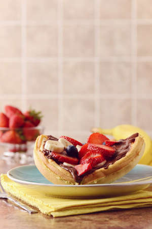 fruit waffle sandwich with chocolate spreadの写真素材