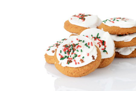 pile of homemade gingerbread sugar cookies with christmas sprinklesの写真素材
