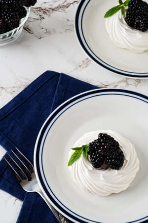 top view blackberry meringue nest with mintの写真素材
