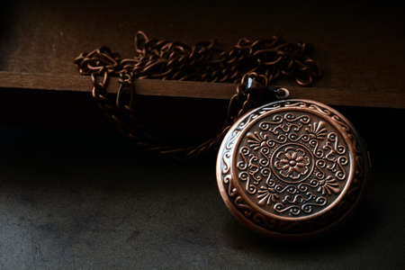 closeup copper locket with chainの写真素材