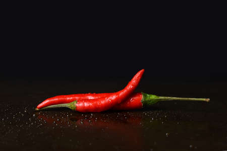 closeup two Hanoi Red Peppers Vietnamese Chiliの写真素材