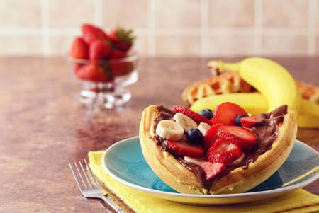 closeup breakfast waffle fruit sandwich with chocolate spreadの写真素材