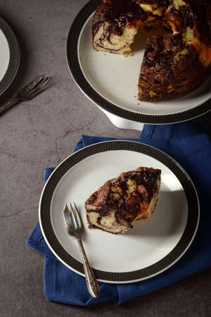 high angle view chocolate marble pound cake with forkの写真素材