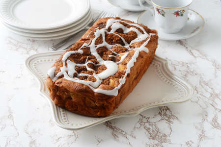 country apple fritter loaf cake with icingの写真素材