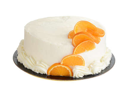 isolated vanilla orange cake on whiteの写真素材