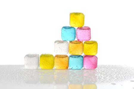 pile of reusable colorful plastic ice cubesの写真素材