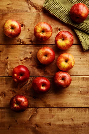 royal gala apples with a green napkinの写真素材