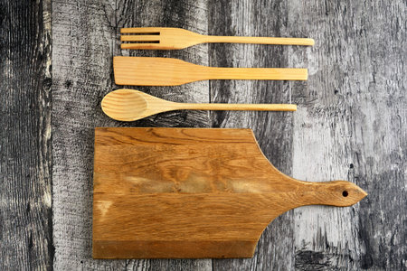 wooden utensils with a retro cutting board