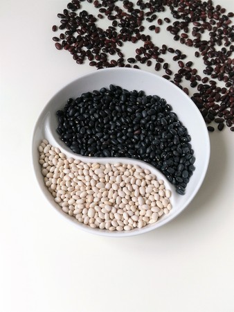 sorting red white black beans by color in the menagerie