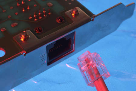 Connecting the cable of modem to componentの写真素材