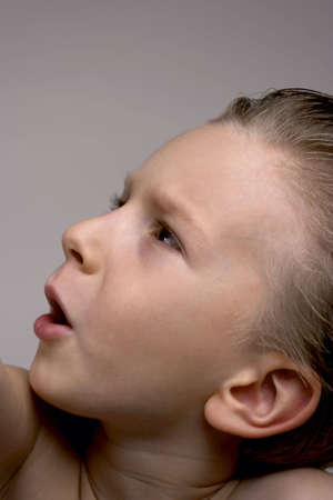 kid posing with serious look.の写真素材