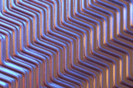 Close-up of metal plate under low light.の写真素材