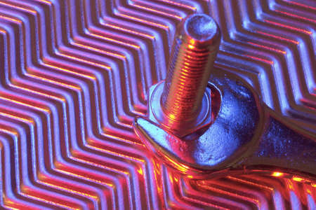 Tools on metal plate under low light.の写真素材