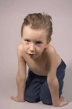 kid posing with serious look.の写真素材