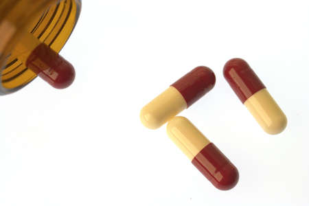 Close-up of Red and white tablets