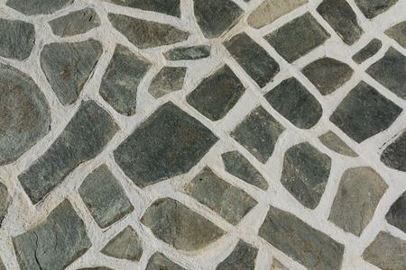 The surface of the stone floor with white seams. Abstraction.の写真素材