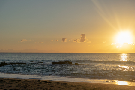 Mediterranean Sea orange sunset on the beachの写真素材