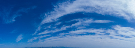 light blue sky with white clouds in summerの写真素材