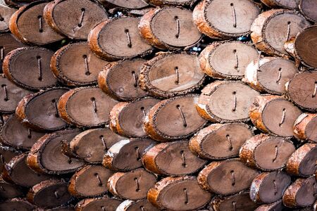 wooden tiles, wooden scales. abstract pattern, texture.
