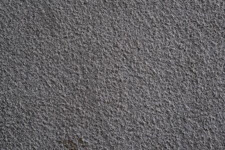 Gray textured plastered wall. Abstract pattern.の写真素材