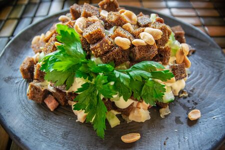 Salad with vegetables, nuts and crackers.の写真素材
