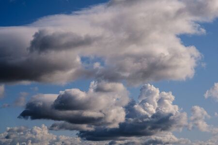 White Clouds In the Blue Sky. Natural background with clouds.の写真素材
