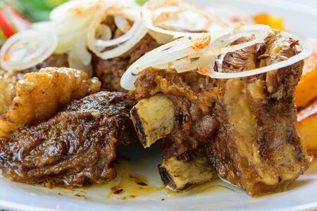 Lamb stew with vegetables. Baked Potato and fresh vegetables with lamb.の写真素材