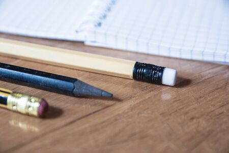 Closeup of pencils and an open daily planner. business or educational concept.