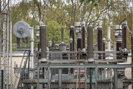 Low Angle View Of electric transformer in power station. Reactor pressure to maintain a constant...
