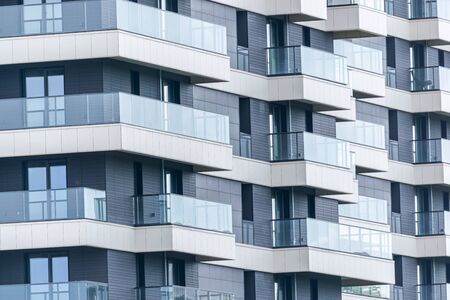 Abstract fragment of modern architecture made of glass and concrete.の写真素材