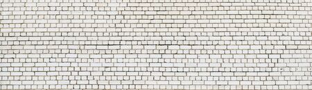 Contemporary weathered white brick wall. Abstract brick texture background panorama.