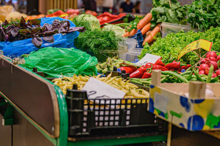 Fresh vegetables for sale at the local ecological market. Rack with organic vegetables. We sell fresh vegetables.の写真素材